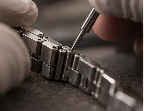 Precision repair to a watch bracelet link